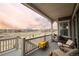 Enjoy the outdoor deck with stunning views, comfortable seating, and grill at 22364 E Bailey Pl, Aurora, CO 80016