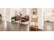 Charming dining room featuring classic wooden furniture and view into the kitchen at 22364 E Bailey Pl, Aurora, CO 80016