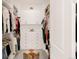 Organized walk-in closet with custom shelving, drawers, and ample storage space at 22364 E Bailey Pl, Aurora, CO 80016