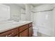 Bathroom features include shower, tub, and vanity with sink at 1601 Venice Ln, Longmont, CO 80503