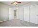 Spacious carpeted bedroom with ample closet space at 1601 Venice Ln, Longmont, CO 80503