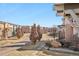 Street view of neighborhood with well-maintained landscaping and sidewalks at 1601 Venice Ln, Longmont, CO 80503