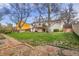 A spacious backyard featuring a well-maintained lawn and deck, perfect for outdoor gatherings at 11203 W Dorado Ave, Littleton, CO 80127
