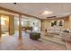 Finished basement featuring ample space, including a seating area, pool table, and extra storage at 11203 W Dorado Ave, Littleton, CO 80127