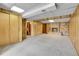 Spacious finished basement featuring carpet, stone fireplace, and closet at 11203 W Dorado Ave, Littleton, CO 80127