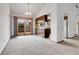 View of breakfast nook area featuring vaulted ceilings, sliding doors, and breakfast bar to kitchen at 11203 W Dorado Ave, Littleton, CO 80127