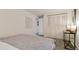 Comfortable bedroom with a closet and neutral color scheme for a calming atmosphere at 1525 S Holly St # 106, Denver, CO 80222