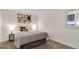 Inviting bedroom with a comfortable bed and tasteful decor at 1525 S Holly St # 106, Denver, CO 80222