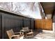 Inviting backyard patio featuring a privacy fence and comfortable seating, perfect for relaxation and outdoor enjoyment at 1020 Stuart St, Denver, CO 80204