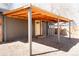 Charming home exterior with covered patio, showcasing a well-maintained facade and functional outdoor space at 1020 Stuart St, Denver, CO 80204