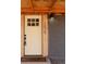 Stylish front door with natural wood trim, brick accents, and modern lighting, creating a welcoming entrance at 1020 Stuart St, Denver, CO 80204