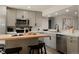 Beautiful kitchen featuring stainless steel appliances, butcher block island, and sleek cabinets at 1020 Stuart St, Denver, CO 80204