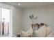 Living room featuring a sliding door to the exterior and modern decor at 1020 Stuart St, Denver, CO 80204