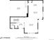 First-floor plan illustrating layout of rooms including the kitchen, living room, dining area, garage, bathroom, and foyer at 9694 Meeker St, Littleton, CO 80125
