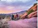 A Gathering hiking in the foothills with scenic views and striking rock formations at 9694 Meeker St, Littleton, CO 80125