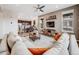 Spacious open-concept living room featuring hardwood floors and abundant natural light at 9694 Meeker St, Littleton, CO 80125