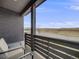 Inviting covered porch with seating, offering a relaxing outdoor space with scenic views at 9694 Meeker St, Littleton, CO 80125