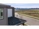 Street view of home featuring mountain views in the distance and a well-maintained street at 9694 Meeker St, Littleton, CO 80125