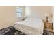 Bedroom featuring a bed, rug, and neutral paint at 162 N Eaton Park St, Aurora, CO 80018