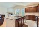 Well-equipped kitchen with granite countertops, stainless steel appliances, and a breakfast bar at 162 N Eaton Park St, Aurora, CO 80018
