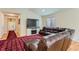 Cozy living room showcasing hardwood floors, vaulted ceilings, and a fireplace at 162 N Eaton Park St, Aurora, CO 80018