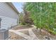 Landscaped side yard with a stone walkway and gravel landscaping at 162 N Eaton Park St, Aurora, CO 80018