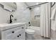 Updated bathroom featuring modern vanity, updated mirror and shower/bath at 5993 Field St, Arvada, CO 80004