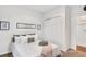 A well-lit bedroom offers soft natural light, a calming color palette and plush decor at 4085 S Crystal Cir # 101, Aurora, CO 80014