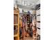 Spacious walk-in closet with ample shelving, hanging racks, and organized storage solutions at 4085 S Crystal Cir # 101, Aurora, CO 80014
