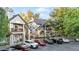 Attractive multi-Gathering residence featuring stone accents, private balconies, and convenient parking at 4085 S Crystal Cir # 101, Aurora, CO 80014