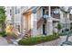 Exterior of the property showcasing stone accents and wood stairs at 4085 S Crystal Cir # 101, Aurora, CO 80014