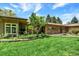 Exterior of a home with a well-manicured lawn and stone accents at 4790 W Lakeridge Rd, Denver, CO 80219