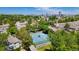 View of the residential neighborhood with tennis courts and mature trees at 6929 E Briarwood Dr, Centennial, CO 80112