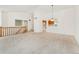 Open concept living room that offers plenty of natural light and an inviting atmosphere for relaxation and entertaining at 6929 E Briarwood Dr, Centennial, CO 80112