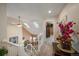 Upstairs hallway with skylights and views into the living area below at 9875 Greensview Cir, Lone Tree, CO 80124