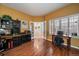 Bright home office with hardwood floors and French doors at 9875 Greensview Cir, Lone Tree, CO 80124