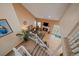 Upstairs living room with vaulted ceiling and fireplace at 9875 Greensview Cir, Lone Tree, CO 80124