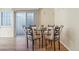 Breakfast nook with glass table and wrought iron chairs at 12224 E Amherst Cir, Aurora, CO 80014