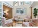 Sunroom with built-in shelving and seating area at 12224 E Amherst Cir, Aurora, CO 80014