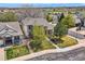Scenic aerial view of neighborhood with manicured lawns and mature trees around the home at 11638 Xavier Way, Westminster, CO 80031