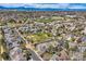 Picture showing a neighborhood with manicured lawns, trees and mountain backdrop at 11638 Xavier Way, Westminster, CO 80031