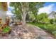 Secluded backyard oasis featuring mature trees, stone pathway, patio and beautiful landscaping at 11638 Xavier Way, Westminster, CO 80031