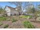 Landscaped backyard features a garden, lawn, and a patio area, ideal for outdoor activities and relaxation at 11638 Xavier Way, Westminster, CO 80031