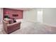 Finished basement area with plush carpeting, recessed lighting, and a comfortable seating area at 11638 Xavier Way, Westminster, CO 80031