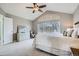 Serene main bedroom with vaulted ceilings and large windows offering natural light at 11638 Xavier Way, Westminster, CO 80031