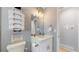 Clean bathroom, featuring a white vanity and updated fixtures at 7609 Sherman Pl, Denver, CO 80221