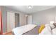 Bright bedroom with a queen-size bed and ample closet space at 7609 Sherman Pl, Denver, CO 80221