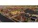 Picturesque aerial view of a neighborhood featuring a two-story home with an attached garage at 26656 E Peakview Dr, Aurora, CO 80016