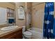 Cozy bathroom with a shower-tub combo and vanity with storage at 26656 E Peakview Dr, Aurora, CO 80016