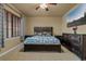 Bedroom featuring a ceiling fan, window, and carpeted floor at 26656 E Peakview Dr, Aurora, CO 80016